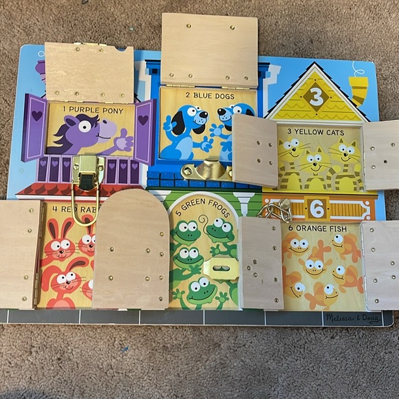 Melissa & Doug Wooden Latches Activity Board - Picture 5 of 5